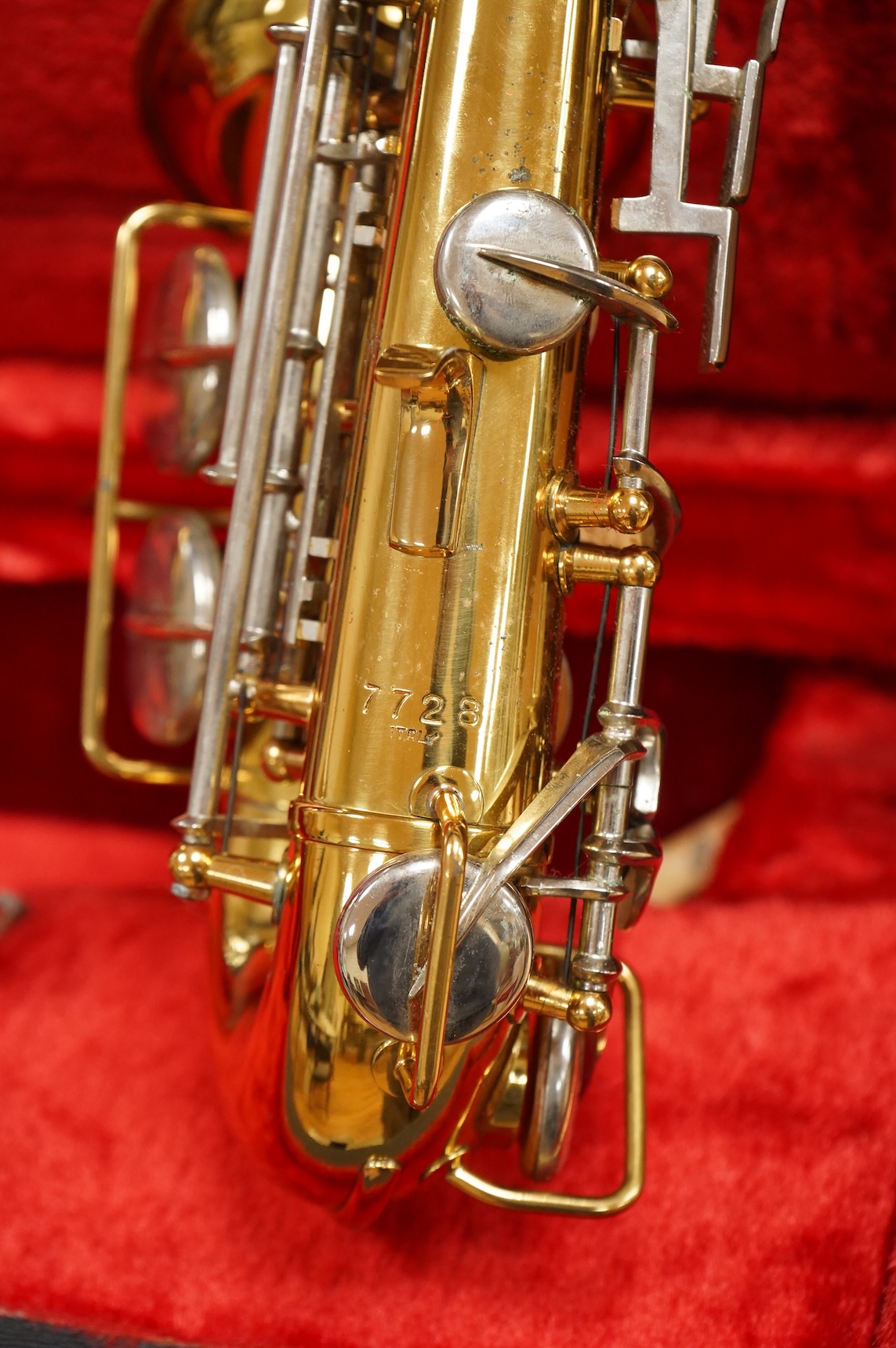 A cased Borgani soprano saxophone